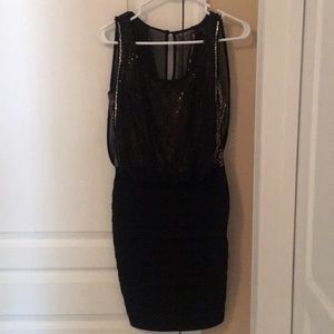 Elegant black and gold sequin dress